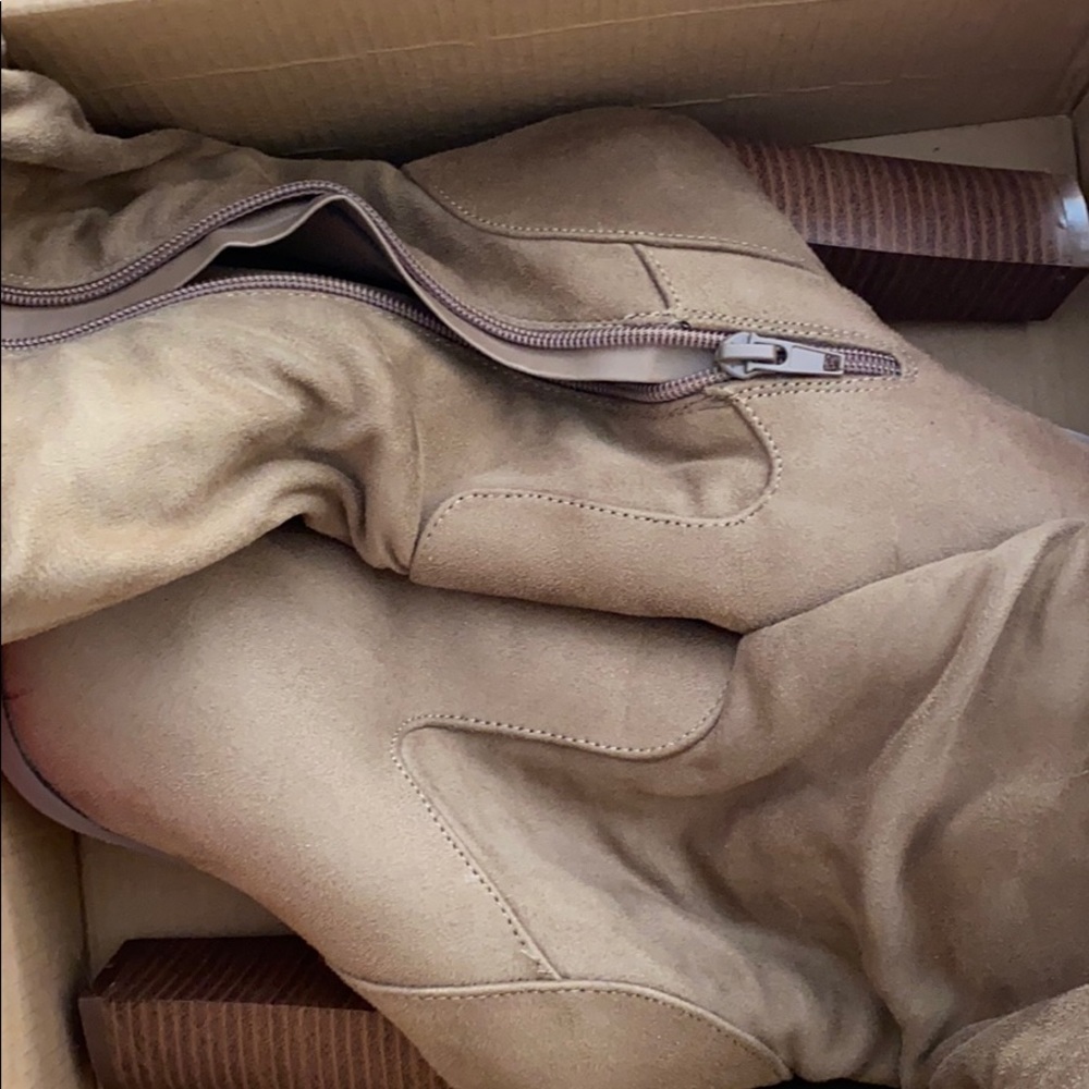 Thigh high heeled boots